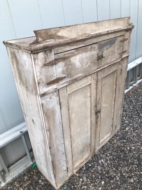 antique cabinet before