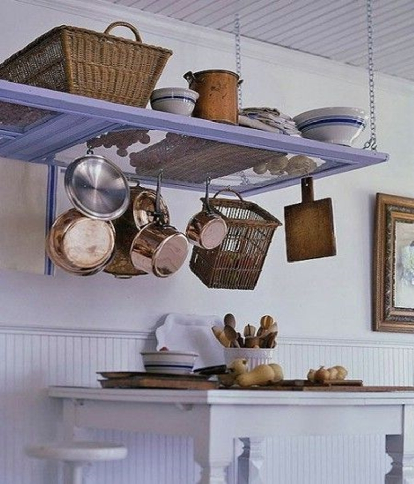 Old door as decor that hangs from the ceiling