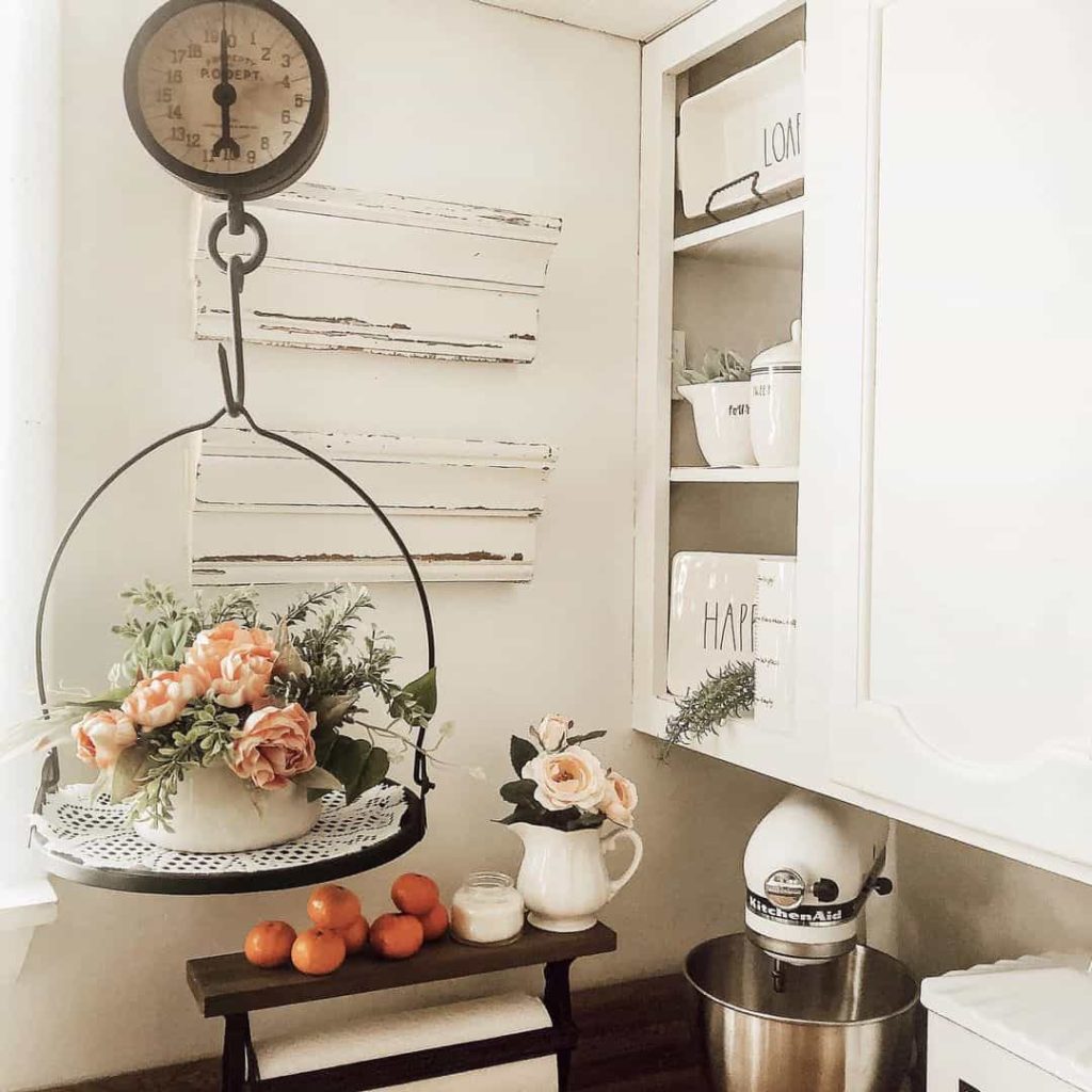 Beautiful vintage kitchen scale suspended from the ceiling