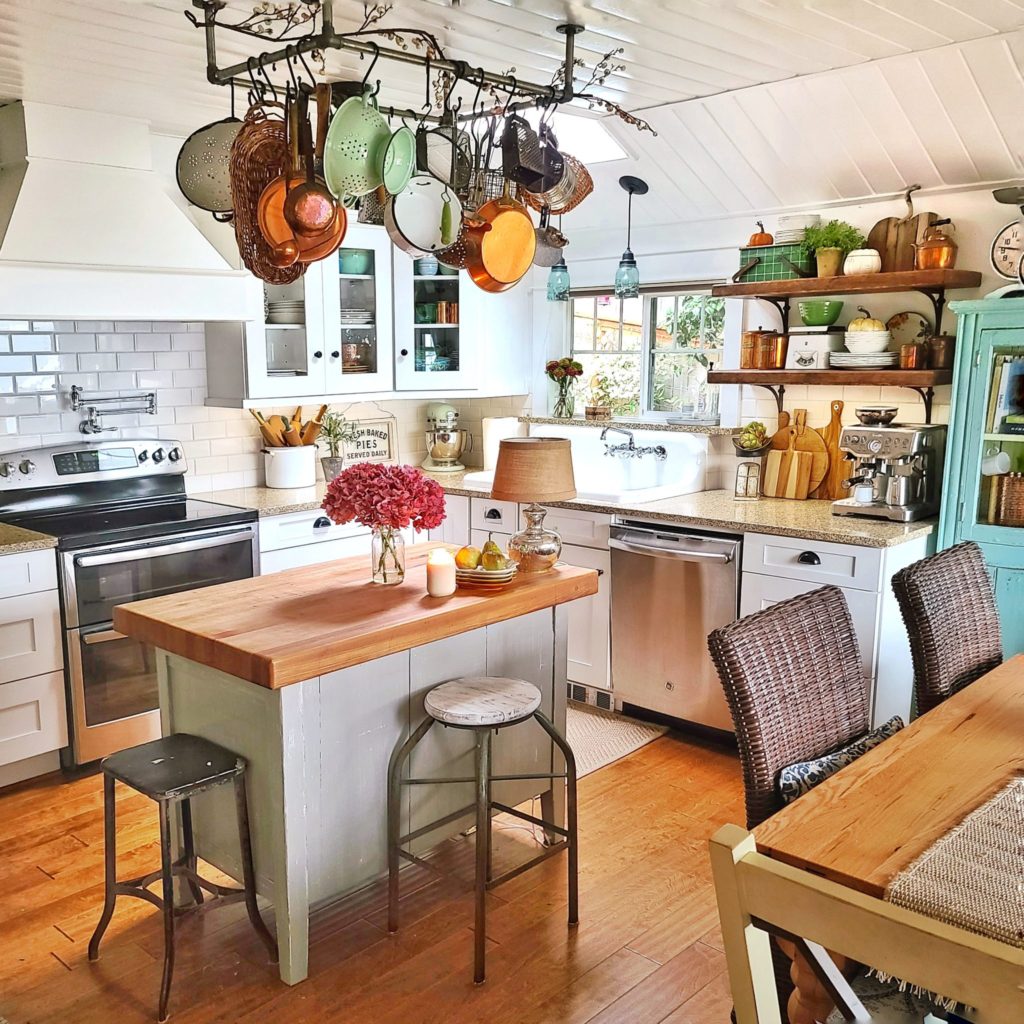 Pots and pans as decoration on the kitchen ceiling