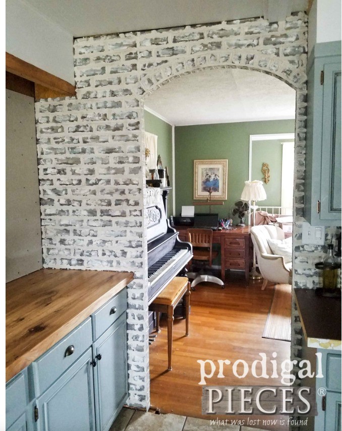 faux brick accent wall in kitchen
