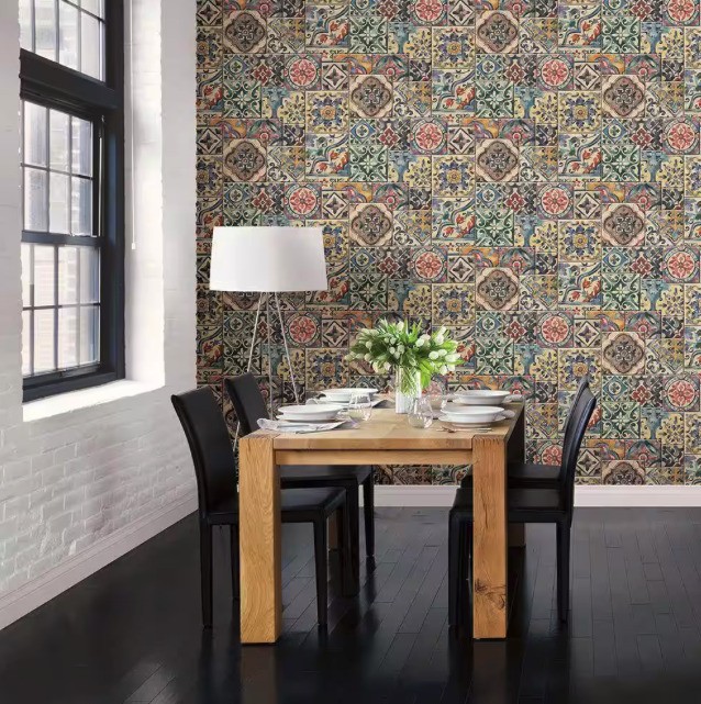 a dining room with peel and stick wallpaper that has lots of colors