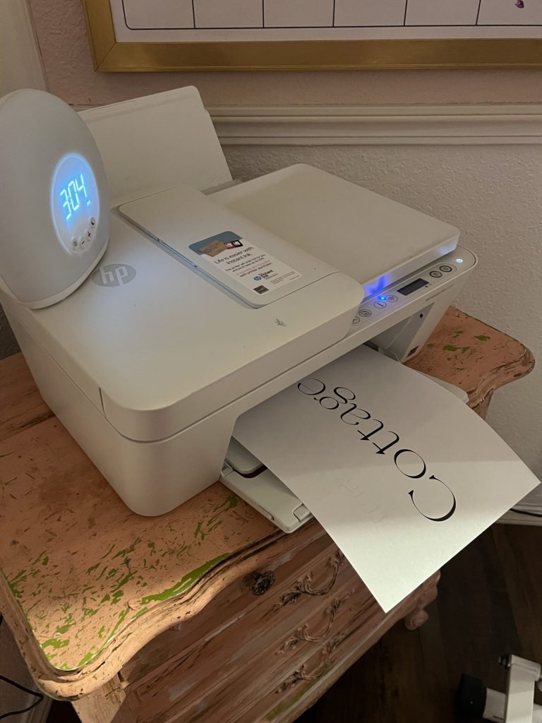 a printer printing out the word "cottage"