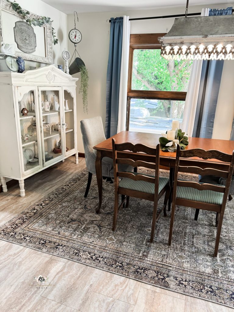cozy dining room view with antique wood table