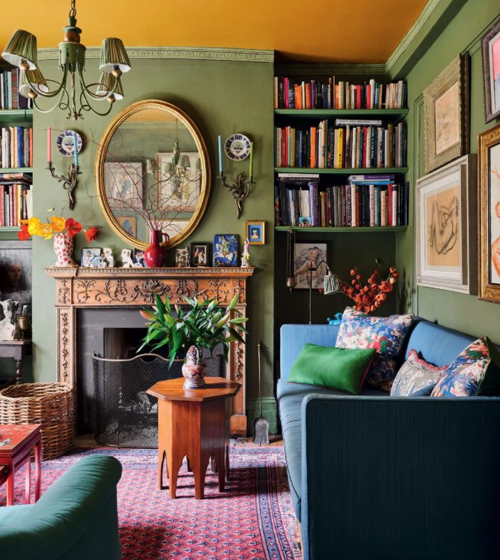 green victorian style room with a maximalist design